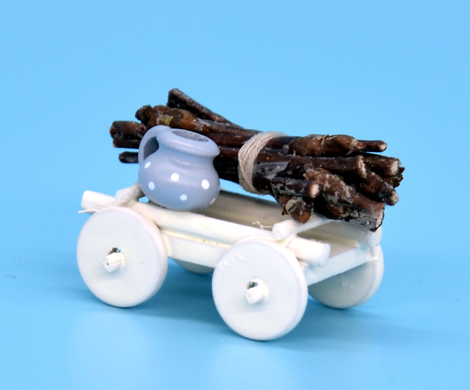 Handwagen mit Holzbündel